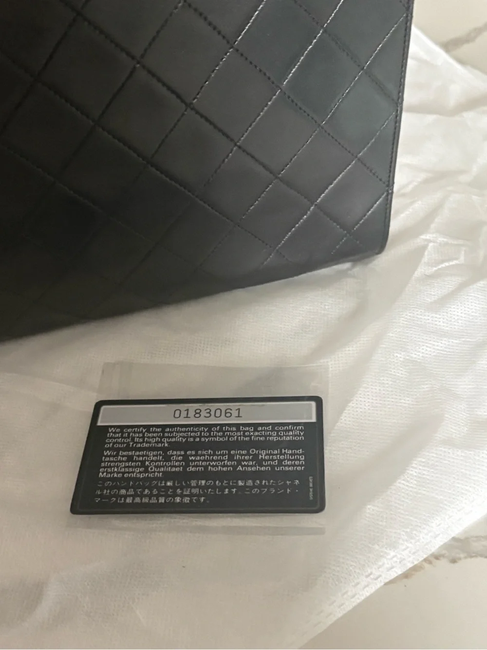CHANEL Black Quilted Leather Shoulder Bag with Gold Chain